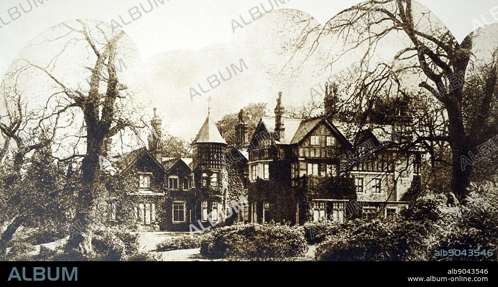 Photograph of the exterior of York Cottage, a house in the grounds of the Sandringham Estate, in Norfolk, England. The cottage, originally called the Bachelor's Cottage, was given Prince George, the Duke of York (later King George V), who lived there with his wife, the future Queen Mary, as a wedding gift. Dated 20th century.