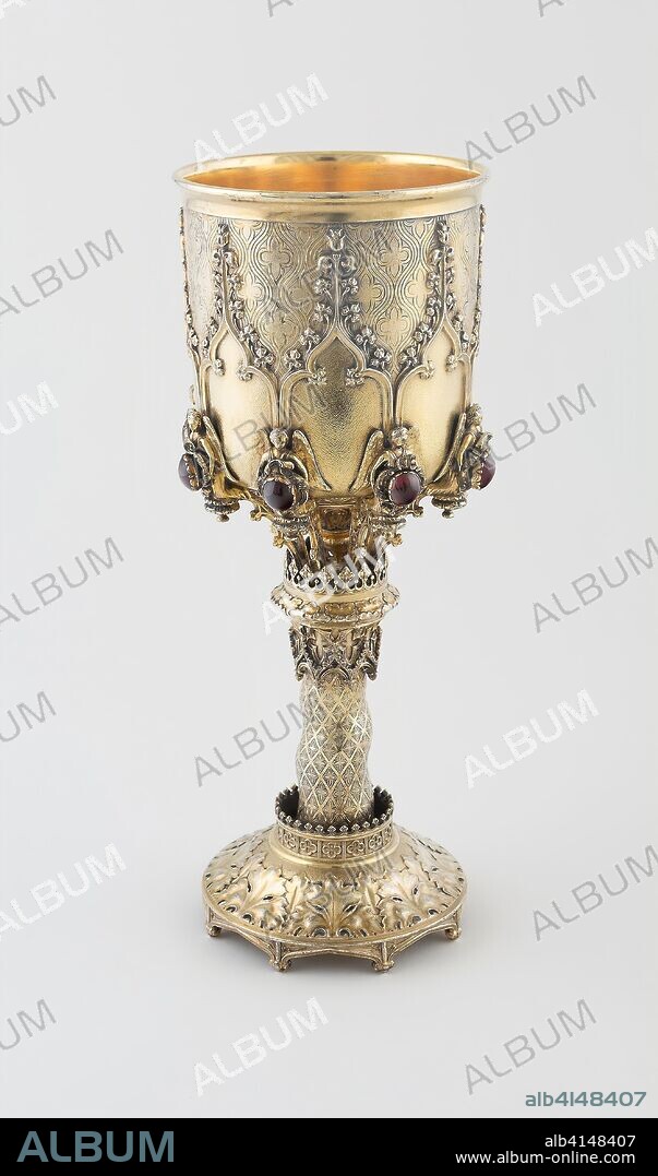 JOHN BRIDGE. Chalice. Designed by Augustus Welby Northmore Pugin; English, 1812-1852; Made by Rundell, Bridge and Rundell; London, 1797-1843. Date: 1827-1828. Dimensions: 28.3 × 12 cm (11 1/8 × 4 3/4 in.). Silver gilt with spessartine garnets. Origin: London.
