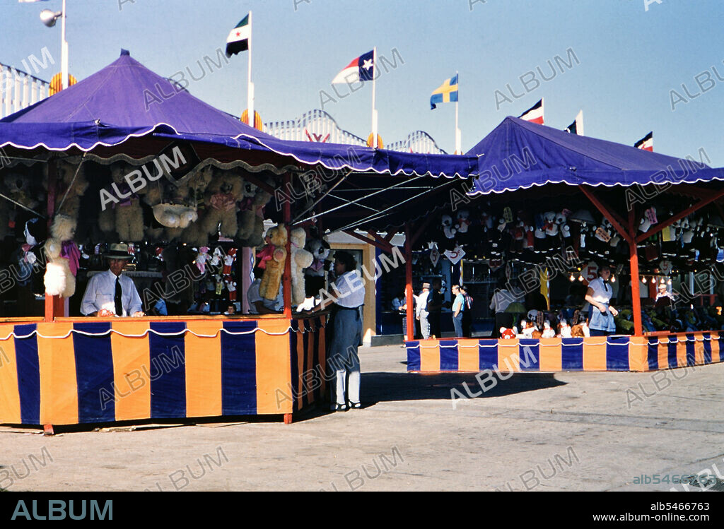 Carnival games on the midway of the Texas State Fair circa 1954-1956.
