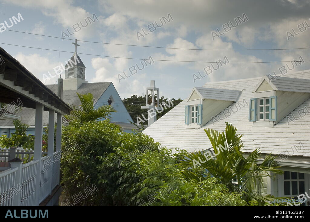 Colonial Buildings and a church in Dunmore Town, Harbour Island, The Bahamas, West Indies, Central America.