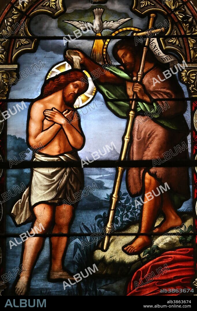 Jesus' baptism in the river Jordan by Saint John the Baptist. Stained glass window. Saint Vincent church. Nyons. France.
