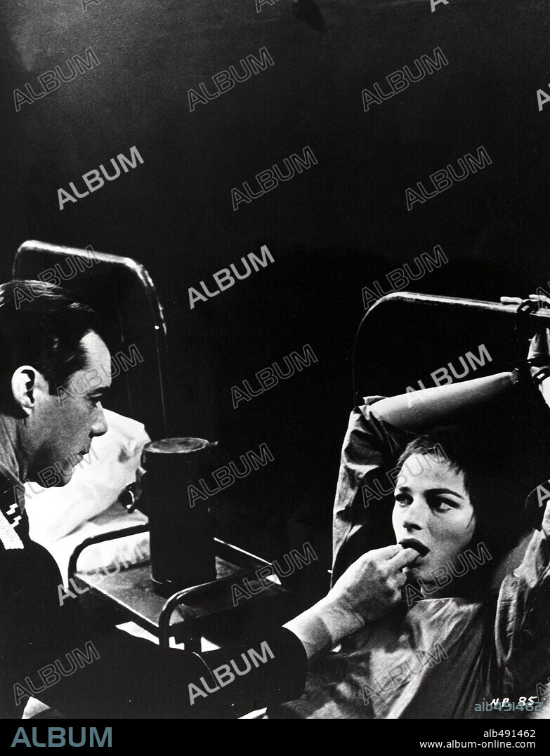 CHARLOTTE RAMPLING and DIRK BOGARDE in THE NIGHT PORTER, 1974 (IL PORTIERE DI NOTTE), directed by LILIANA CAVANI. Copyright ITAL-NOLEGGIO CINEMATOGRAFICO/LOTAR FILM PRODUCTIONS.