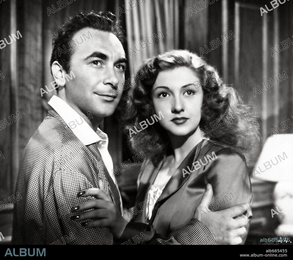 ADRIANO RIMOLDI and AMPARO RIVELLES in ANGUSTIA, 1947. Copyright COOPERATIVA CINEMATOGRAFICA CONSTELACION.