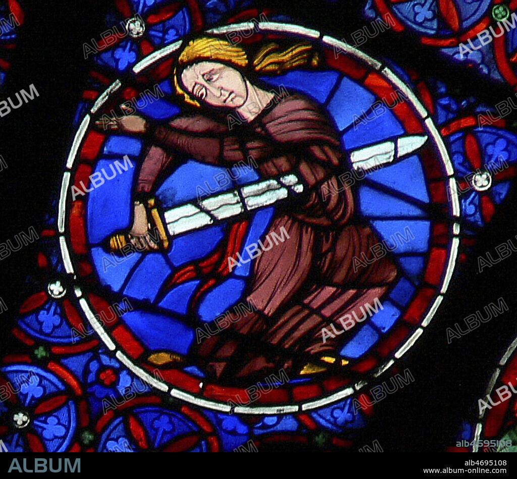 Les vices et les vertus. Le desespoir : une femme se plante une epee dans le coeur. Vitrail de la cathedrale Notre-Dame de Paris datant du 13eme s. Photographie par Painton Cowen. Credit : Collection Cowen/KHARBINE-TAPABOR.