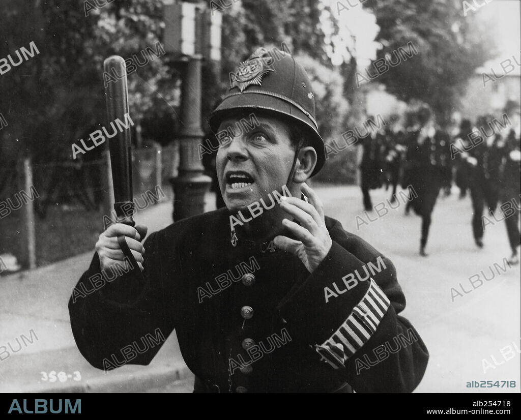 NORMAN WISDOM in ON THE BEAT, 1962, directed by ROBERT ASHER.