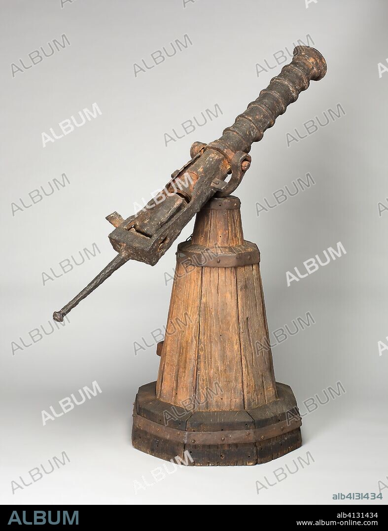 Breech-Loading Swivel Gun with Chamber on Stand. Western European. Date: 1500-1533. Dimensions: Length overall of cannon: 33 1/2 in. (81.5 cm)
Overall length of cannon in frame including handle: 58 7/8 in. (149.6 cm)
Diameter of breech opening of cannon: 2 7/8 in. (7.3 cm)
Diameter at flared muzzle: 2 1/4 in. (5.7 cm)
Diameter of breech clock opening: 1 5/32 in. (3 cm)
Diameter at base of breech block: 4 3/4 in. (11.2 cm)
Overall length of breech block: 8 11/32 in. (21.2 cm)
Weight of breech block: 23 lb. 7 oz. Iron. Origin: Western Europe.