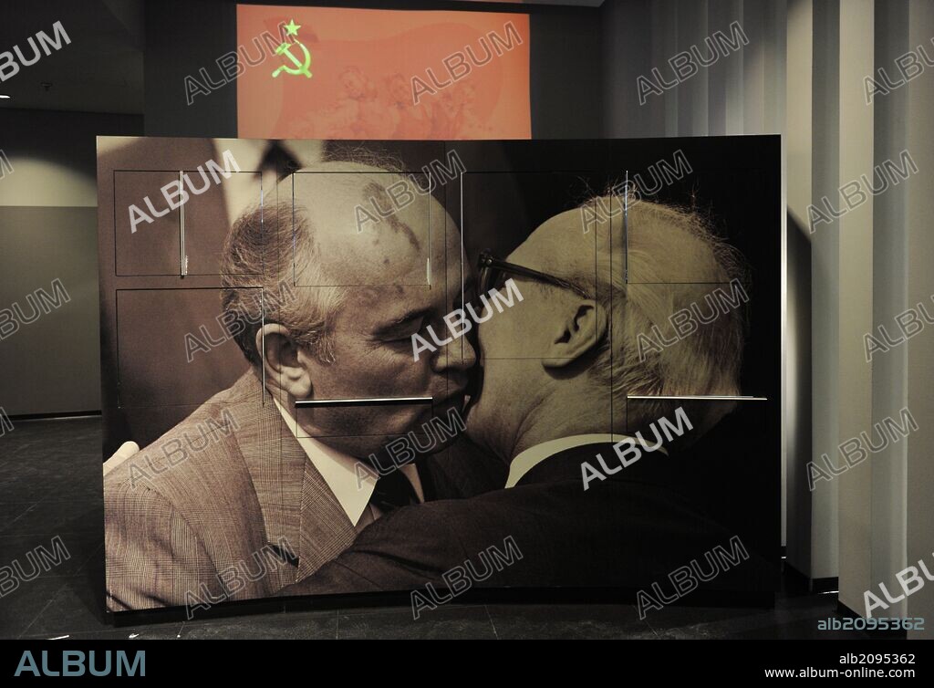 Erich Honecker (1912-1994) and Mikhail Gorbachev (1931) giving a kiss. Photo panel. DDR Museum. Berlin. Germany.