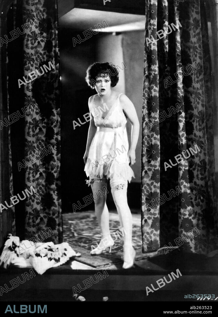 CLARA BOW in RED HAIR, 1928, directed by CLARENCE G. BADGER. Copyright PARAMOUNT FAMOUS LASKY CORPORATION.