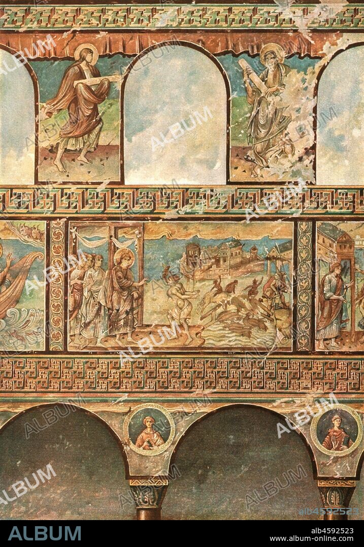 Mural paintings in the Church of St. George, Oberzell, Reichenau, Germany, (1928). 'About 1000...In the middle: exorcising the devils at Gerasa', Exorcism of the Gerasene demoniac or the Healing of the Demon-Possessed Man. After R. Borrmann. Plate LI, fig 110, from "An Encyclopaedia of Colour Decoration from the Earliest Times to the Middle of the XIXth Century" with explanatory text by Helmuth Bossert. [Ernst Wasmuth Ltd., Berlin, 1928].