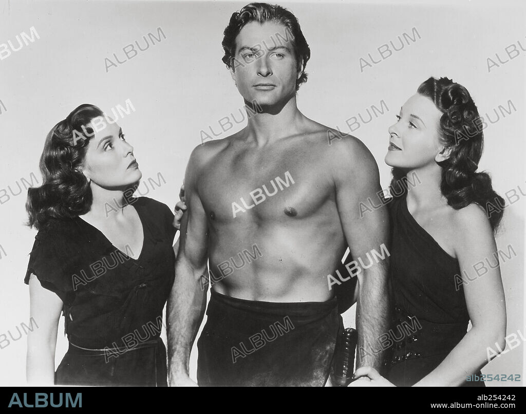 BRENDA JOYCE and EVELYN ANKERS in TARZAN'S MAGIC FOUNTAIN, 1949, directed by LEE SCHOLEM. Copyright RKO.