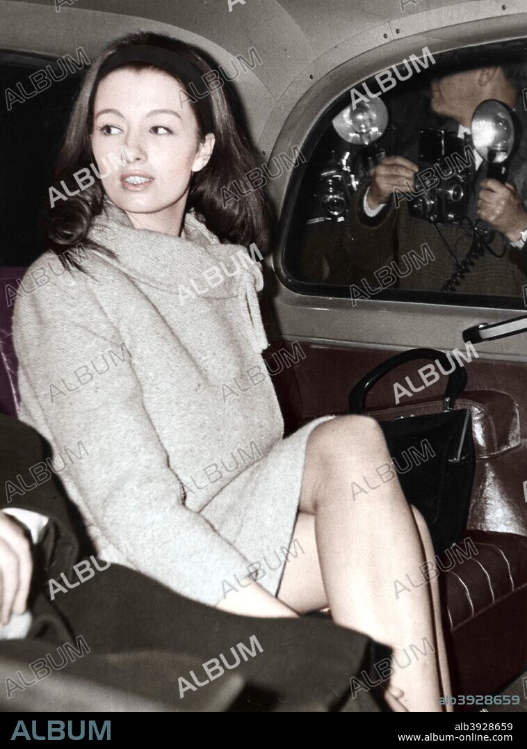 Christine Keeler arriving at the Old Bailey, London, 1963. Christine Keeler's affair with John Profumo, the Secretary of State for War caused a scandal that rocked the Conservative government of Harold MacMillan. Unknown to Profumo, Keeler was also having an affair with Yevgeny Ivanov, a naval attache with the Soviet Embassy. (Colorised black and white print).