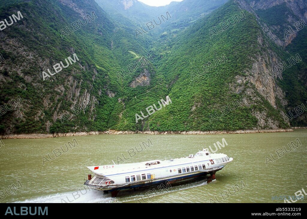 The Three Gorges or Yangtze Gorges span from the western—upriver cities of Fengjie and Yichang in Chongqing Municipality eastward—downstream to Hubei province. The Yangtze River (Chang Jiang)—Three Gorges region has a total length of approximately 200 kilometres (120 mi). The Three Gorges occupy approximately 120 kilometres (75 mi) within this region.  The Chang Jiang (Yangzi River) is the longest river in China and third longest in the world. Known upstream as the Golden Sand River, it flows through the geographical, spiritual and historical heart of China. From its source in the Tanggula Mountains of Qinghai province, the Yangzi flows southeast through Tibet as the Tongtian, turns south, then north as the Jinsha, and becomes the Yangzi proper after Yibin in Sichuan. Here, it swings eastwards once again, crossing Hubei, Hunan, Jiangxi, Anhui and Jiangsu provinces to reach the East China Sea at Shanghai. Its source-to-mouth length is 6,300 km (3,915 miles).