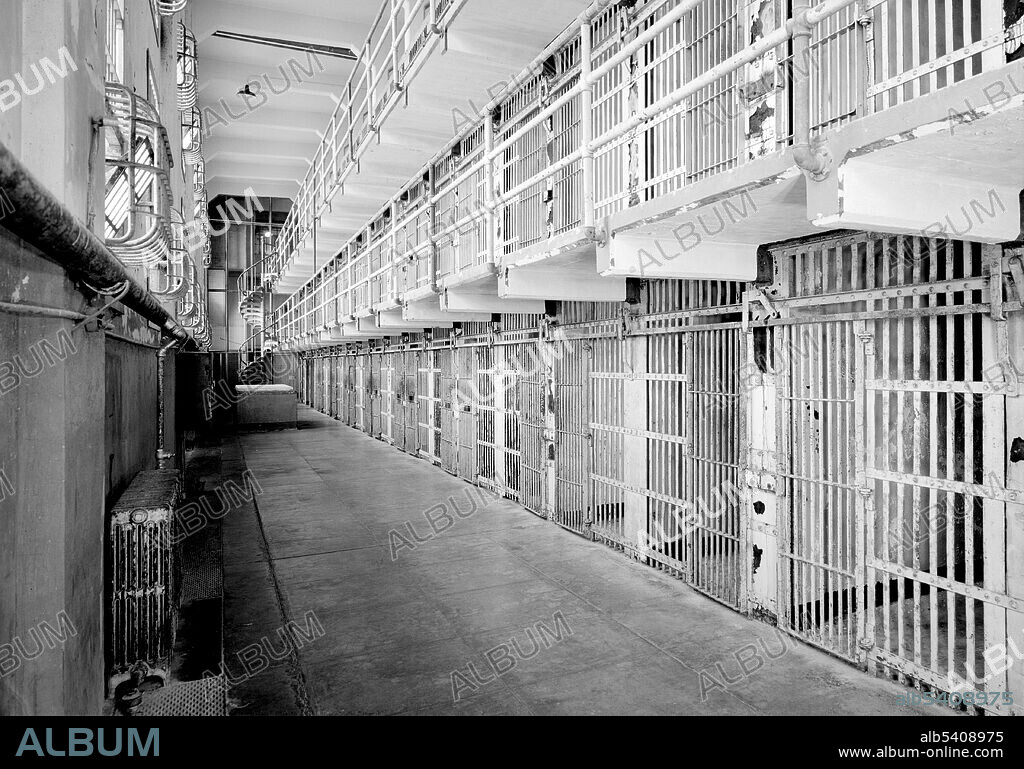 Cell block A. A-Block was never modernized, so retained its flat strap-iron bars, key locks and spiral staircases from the original military prison. The Alcatraz Federal Penitentiary was a maximum security federal prison on Alcatraz Island, 1.25 miles off the coast of San Francisco, California, United States, which operated from August 11, 1934, until March 21, 1963. Historic American Buildings Survey, Jet Lowe, 1986 (cropped and cleaned).
