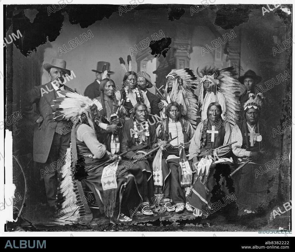 Sioux and Arrapahoe Indian Delegations, between 1865 and 1880. L to R, seated: Red Cloud, Big Road, Yellow Bear, Young Man Afraid of his Horses, Iron Crow. L to R, standing: Little Bigman, Little Wound, Three Bears, He Dog.