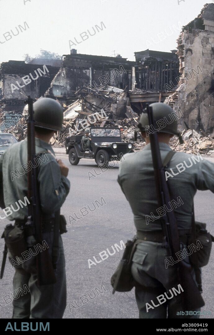 National Guard troops in Detroit during the riot of 1967. The riot was sparked by a police raid of an after-hours bar in a predominantly black neighborhood, at which 82 people (gathered to celebrate the return of two Vietnam veterans) were arrested, in the early hours of Sunday, July 23, 1967. Confrontations with police quickly escalated into looting, arson, and general destruction on a large scale, which lasted for several days, during which both the National Guard and the Army became involved. When the dust settled, 43 people were dead, 467 were injured, hundreds of buildings had been burned and thousands of stores looted.