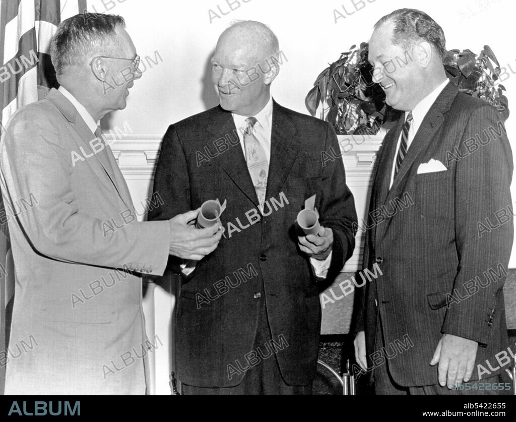 President Eisenhower with Hugh Dryden and T. Keith Glennan, August 19, USA, 1958. US President Dwight D. Eisenhower (centre) swears in Dr. T. Keith Glennan (right) as the first administrator of the National Aeronautics and Space Administration, and Dr. Hugh Dryden as deputy administrator. NASA was created in 1958, to perform civilian research related to space flight and aeronautics.
