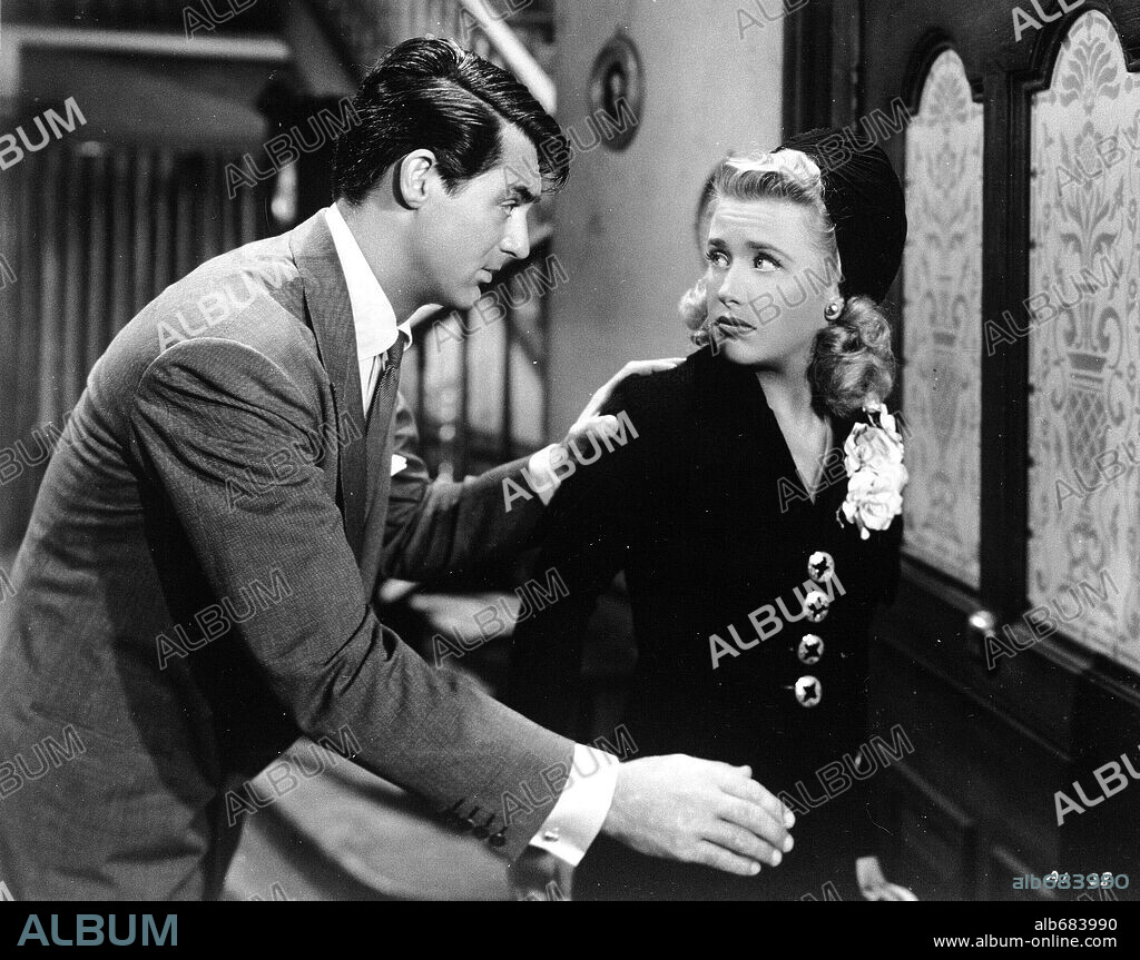 CARY GRANT and PRISCILLA LANE in ARSENIC AND OLD LACE, 1944, directed by FRANK CAPRA. Copyright WARNER BROTHERS.