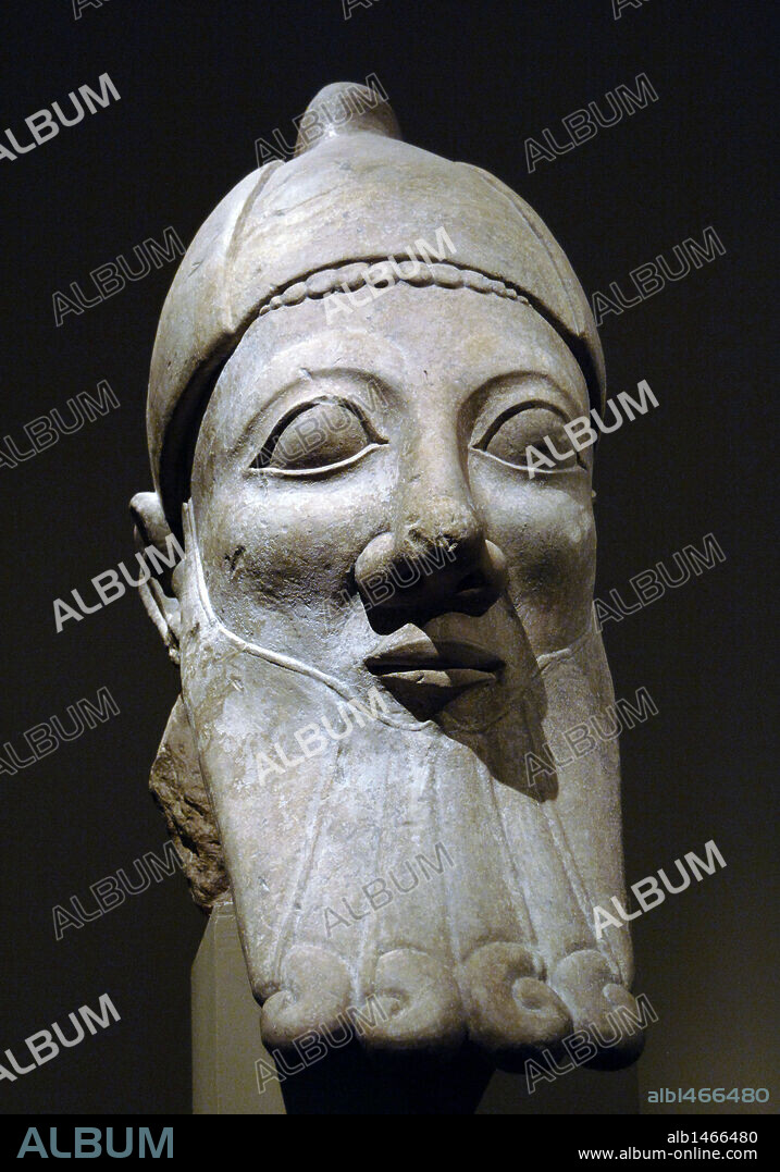 ARTE FENICIO. CHIPRE. CABEZA DE UN HOMBRE con barba. Fechada en el S. VI aC. Piedra caliza. Procede de Golgoi (Chipre). Museo Metropolitano de Arte. Nueva York. Estados Unidos.