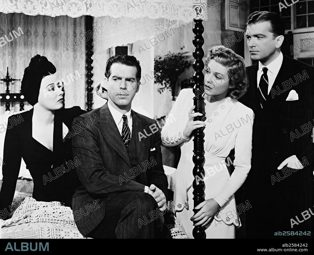 FRED MACMURRAY, MADELEINE CARROLL and PATRICIA MORISON in ONE NIGHT IN LISBON, 1941, directed by EDWARD H. GRIFFITH. Copyright PARAMOUNT PICTURES.