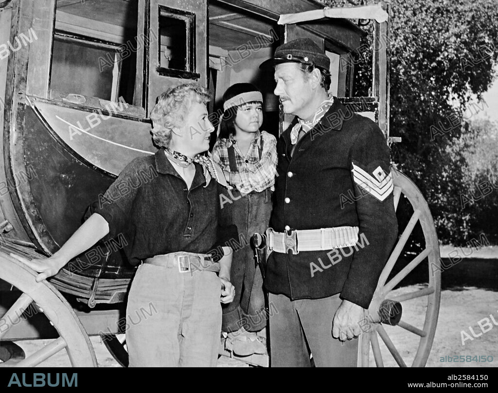 BARBARA STANWYCK and JOEL MCCREA in TROOPER HOOK, 1957, directed by CHARLES MARQUIS WARREN. Copyright UNITED ARTISTS.