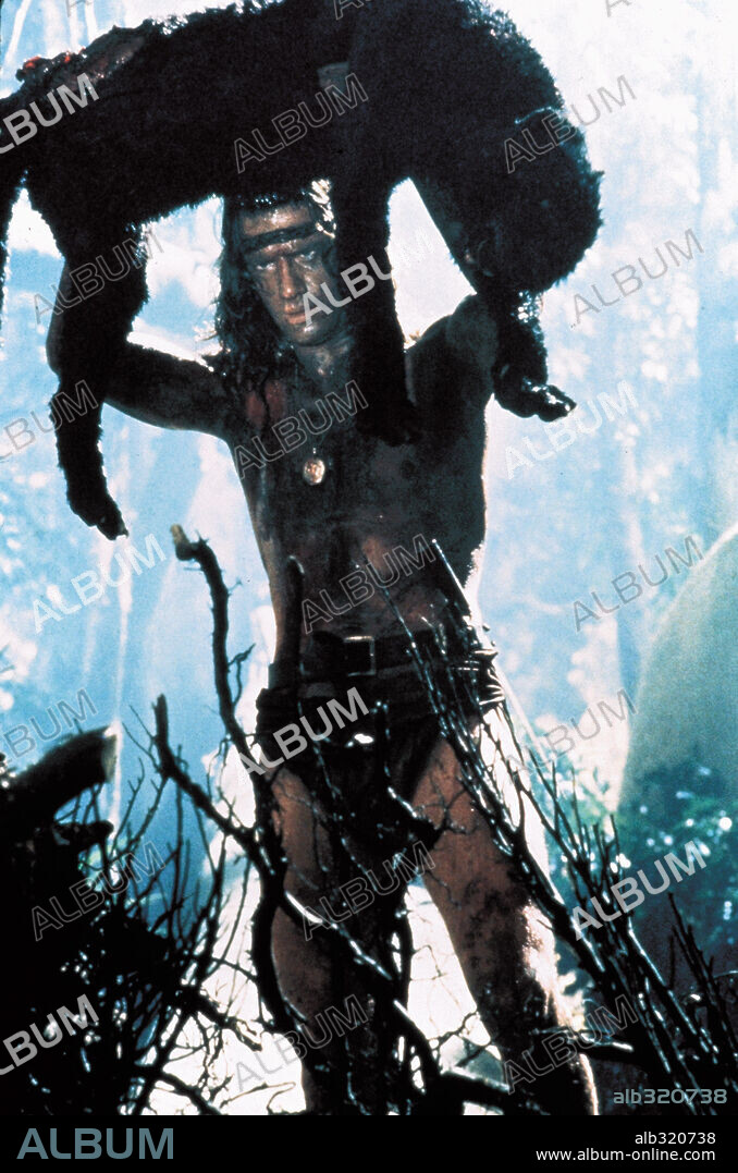 CHRISTOPHER LAMBERT dans GREYSTOKE: THE LEGEND OF TARZAN, LORD OF THE APES, 1984, réalisé par HUGH HUDSON. Copyright WARNER BROTHERS.