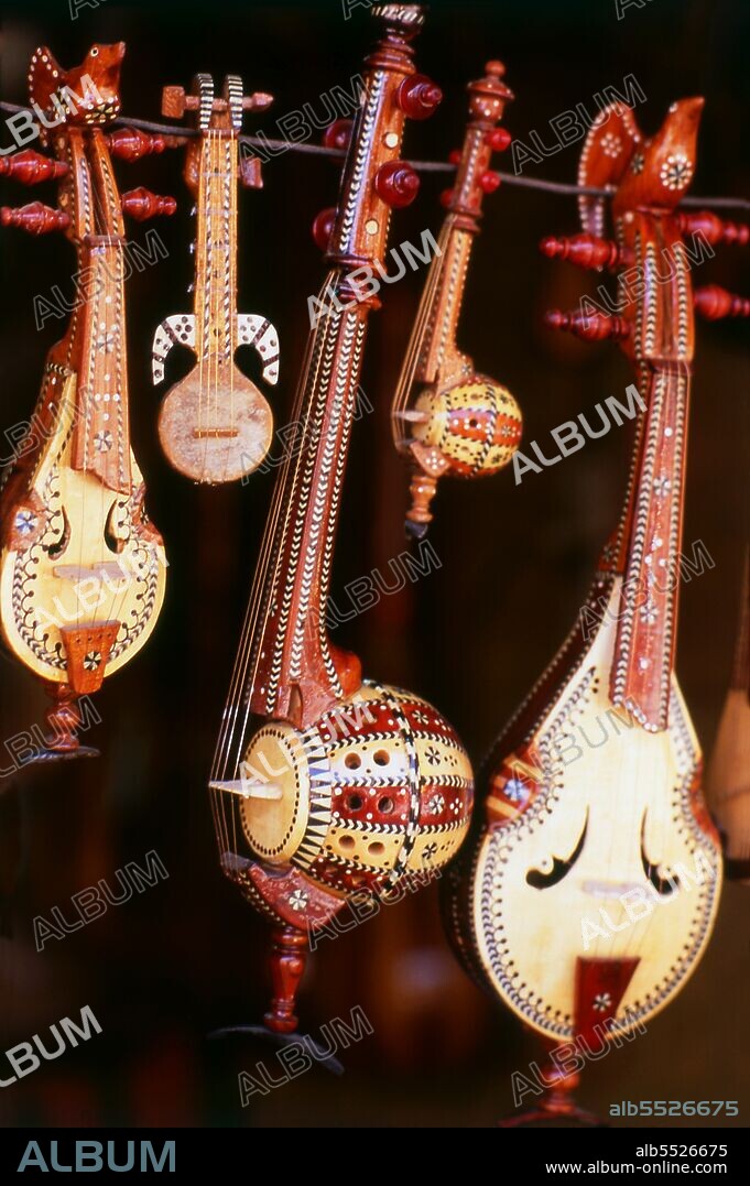 The Ghijäk or spike fiddle has a soundboard of stretched skin and is bowed. The Khushtar is also bowed,but its tone is lower and sofetr than the Ghijäk. The earliest mention of Kashgar occurs when a Chinese Han Dynasty (206 BCE – 220 CE) envoy traveled the Northern Silk Road to explore lands to the west. Another early mention of Kashgar is during the Former Han (also known as the Western Han Dynasty), when in 76 BCE the Chinese conquered the Xiongnu, Yutian (Khotan), Sulei (Kashgar), and a group of states in the Tarim basin almost up to the foot of the Tian Shan mountains. Ptolemy spoke of Scythia beyond the Imaus, which is in a 'Kasia Regio', probably exhibiting the name from which Kashgar is formed. The country’s people practised Zoroastrianism and Buddhism before the coming of Islam. The celebrated Old Uighur prince Sultan Satuq Bughra Khan converted to Islam late in the 10th century and his Uighur kingdom lasted until 1120 but was distracted by complicated dynastic struggles. The Uighurs employed an alphabet based upon the Syriac and borrowed from the Nestorian, but after converting to Islam widely used also an Arabic script. They spoke a dialect of Turkic preserved in the Kudatku Bilik, a moral treatise composed in 1065.