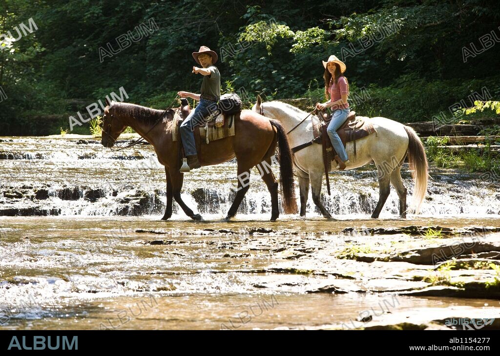 LUCAS TILL and MILEY CYRUS in HANNAH MONTANA: THE MOVIE, 2009, directed by PETER CHELSOM. Copyright millar gough ink/walt disney pictures.