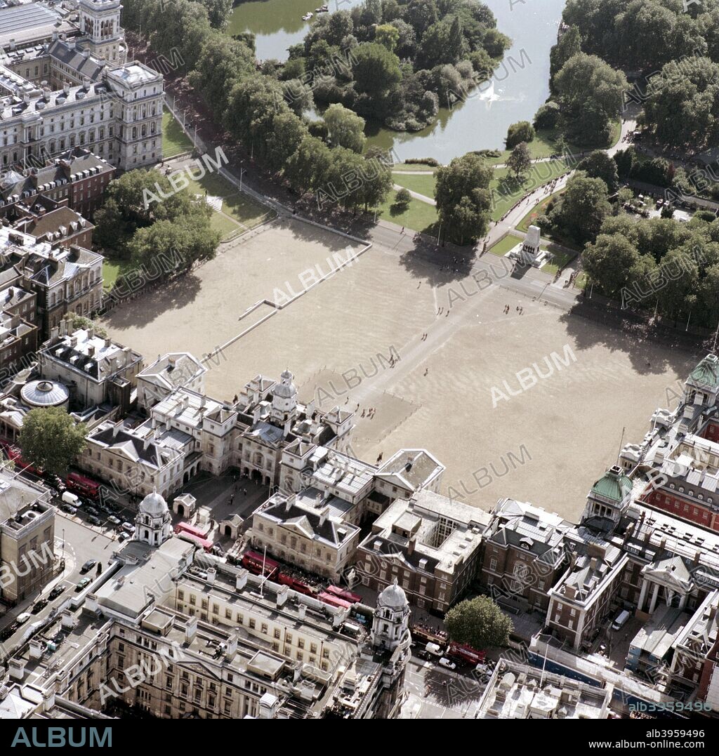 Horse Guards Parade, Whitehall, London, 2002.Situated between Whitehall and St James's Park Horse Guards is the army headquarter building and is adjacent to the famous parade ground. Two mounted troopers of the Household Division guard the entrance to the central arch, which only members of the Royal Family are permitted to drive through.