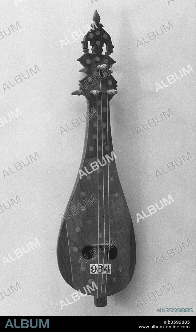 Rebec. Culture: Cretan. Dimensions: W. 6 × L.19 1/2 in. (15.2 × 49.5 cm). Date: 19th century.
This "old-style" Cretan lira is a minstrel instrument played with a bow to which jingles are attached.