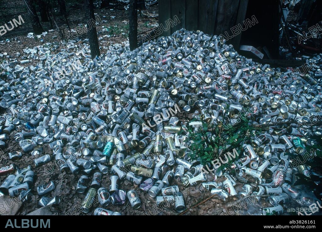 Beer can dump in an oak-juniper woodland south of Fort Worth, Texas in June, 1986.