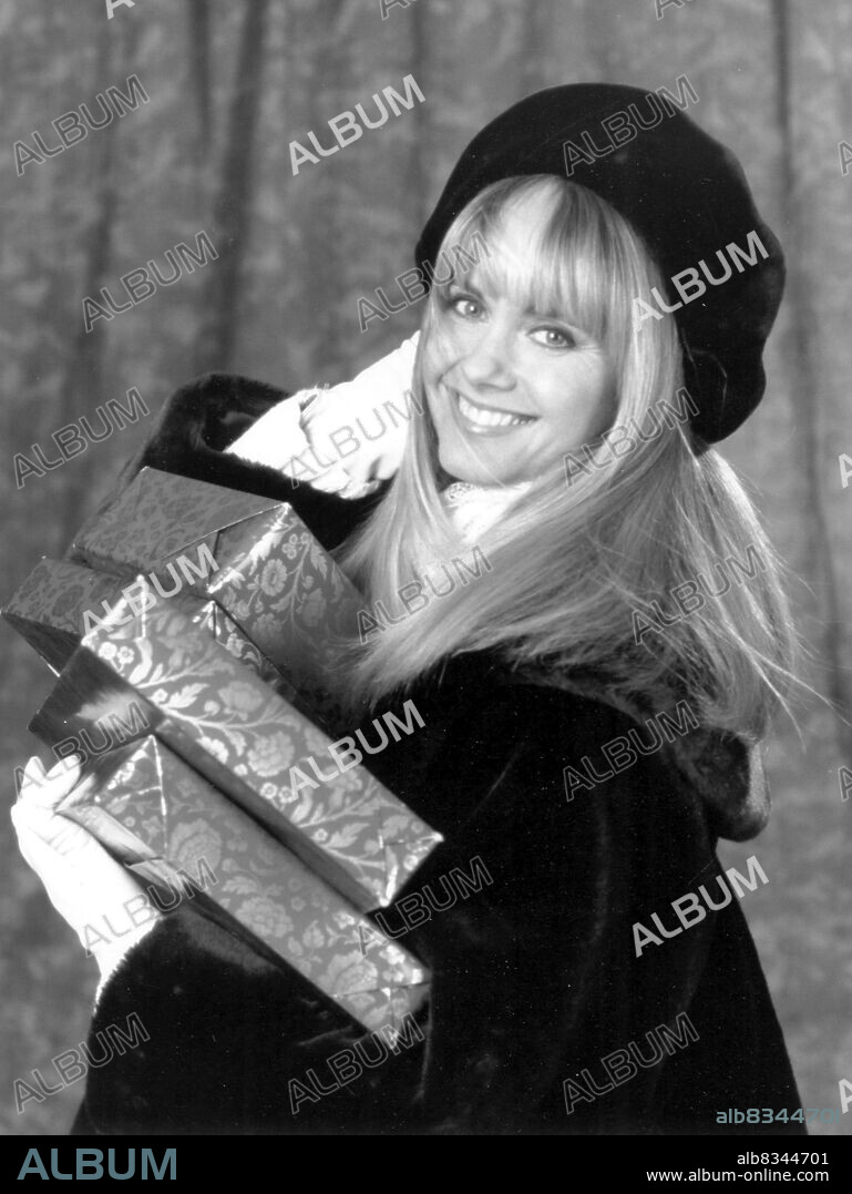 OLIVIA NEWTON-JOHN in A MOM FOR CHRISTMAS, 1990, directed by GEORGE T. MILLER. Copyright WALT DISNEY TELEVISION.