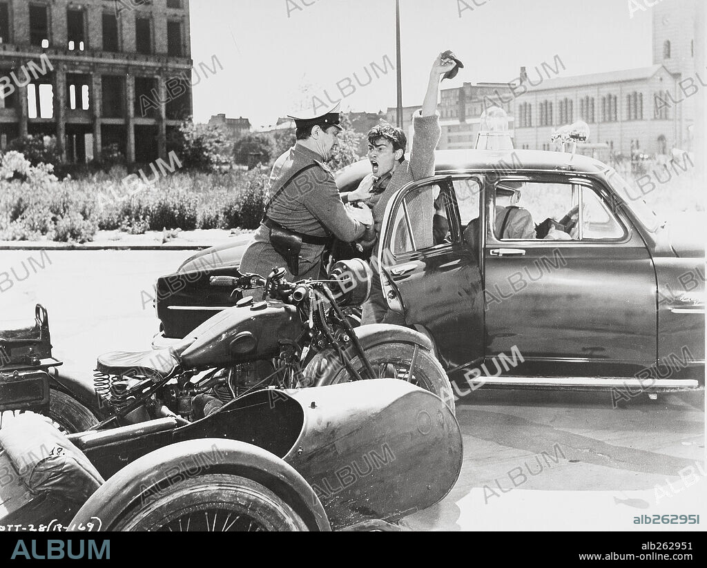 HORST BUCHHOLZ in ONE, TWO, THREE, 1961, directed by BILLY WILDER. Copyright MIRISCH/UNITED ARTISTS.