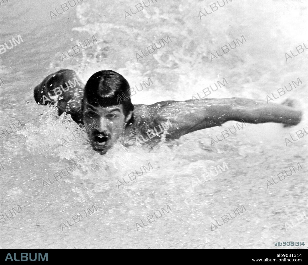September 1972: Munich Olympics: American swimmer, Mark Spitz (USA) wins his 7th gold medal.