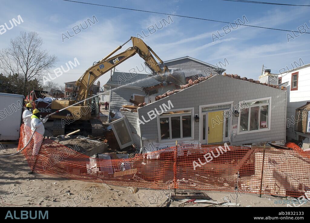 Hurricane Sandy Aftermath. Demolition of damaged house. Breezy Pt. Queens, NY.