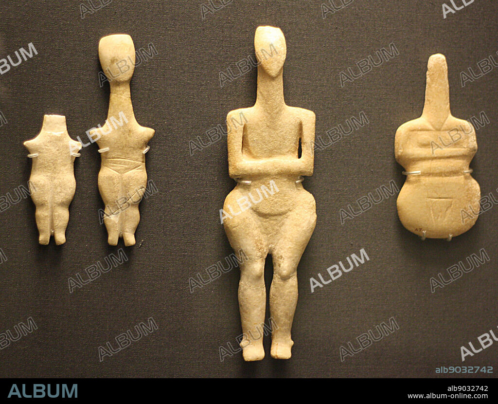Marble figurine of a woman (Plastiras type) Cycladic (grotta-pelos culture)3000-2800 BC. Said to be from Grave 'D' of the Kapros cemetery, Amorgos. The long neck, angular upper body and bulging thighs are characteristic of this type but the cut out areas separating the upper arms from the body are unusual.