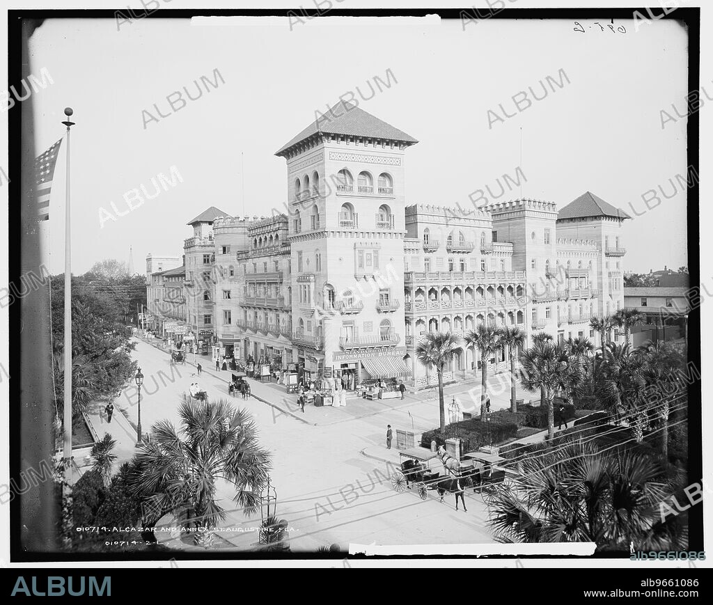 Hotel Alcazar and annex, St. Augustine, Fla., c1903. Hotel commissioned by Henry Flagler, to appeal to wealthy tourists who traveled south for the winter on his railroad, the Florida East Coast Railway. It was designed in the Spanish Renaissance Revival style by Carrère and Hastings. Note Standard Guide Information Bureau and souvenir shops.