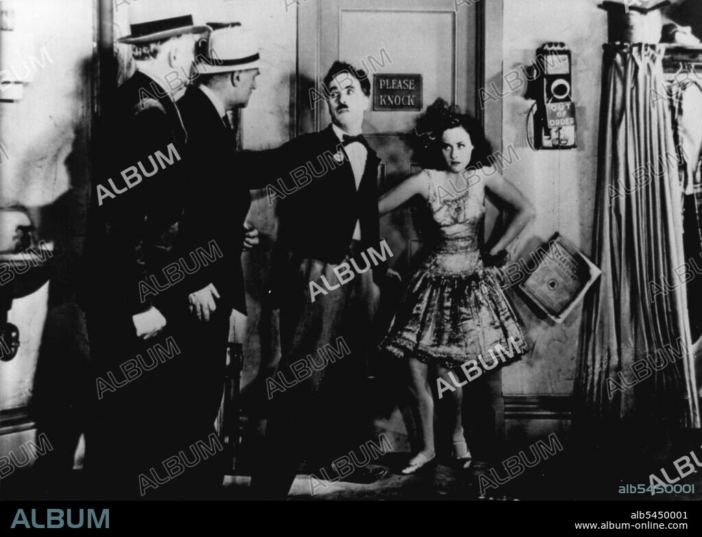 Charlie Chaplin - Actor. Born Britain. In scene from the 1936 film 'Modern Times'. January 1, 1936. (Photo by Universal Pictorial Press Photo).