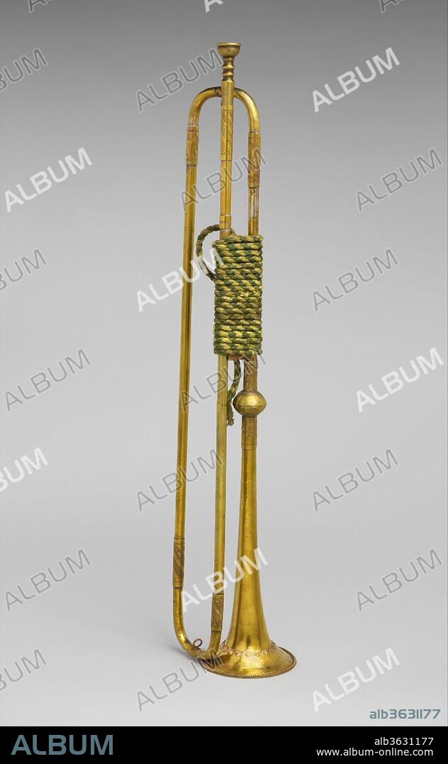 Natural Trumpet. Culture: German. Dimensions: Depth (Without crook or mouthpiece): 25 11/16 in. (65.3 cm)
Diameter (Of bell): 4 7/16 in. (11.3 cm). Maker: Johann Wilhelm Haas (German, Nuremberg 1649-1723 Nuremberg). Date: late 17th century.
Natural trumpets such as this were used in the military and in royal pagentry. The production and playing of trumpets in Germany during the seventeenth and early eighteenth centuries was strictly regulated by a guild system. The four generations of the Haas family were the most prolific and prominent dynasty of brass instrument makers working in Nuremberg. Their trumpet output ranged from simply ebellished brass examples such as this to ornately decorated silver trumpets with gold gilding like 54.32.1.