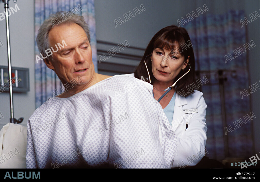 ANJELICA HUSTON and CLINT EASTWOOD in BLOOD WORK, 2002, directed by CLINT EASTWOOD. Copyright WARNER BROS. PICTURES / WALLACE, MERIE W.