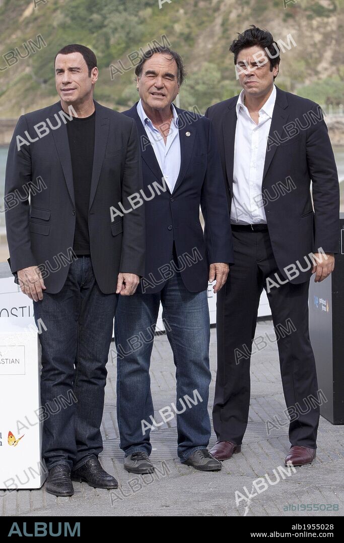 BENICIO DEL TORO, OLIVER STONE and TRAVOLTA JOHN. Sept. 23, 2012 - San Sebastian, Spain - Actor John Travolta, director Oliver Stone and actor Benicio Del Toro attend the ''Savages'' photocall during the Festival Internacional de Cine de Donostia-San Sebastian 2012 / 60th San Sebastian International Film Festival, Spain on September 23, 2012. 23/09/2012