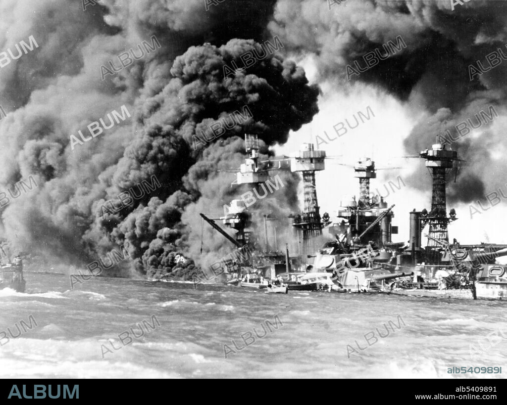 USS West Virginia (BB-48) afire forward, immediately after the Japanese air attack. USS Tennessee (BB-43) is on the sunken battleship's opposite side. Naval photograph documenting the Japanese attack on Pearl Harbor. Much of Pearl Harbor and surrounding lands is a United States Navy deep-water naval base. It is also the headquarters of the U.S. Pacific Fleet. The attack on Pearl Harbor by the Empire of Japan on Sunday, December 7, 1941, brought the United States into WWII. U.S. Navy (cropped and cleaned).