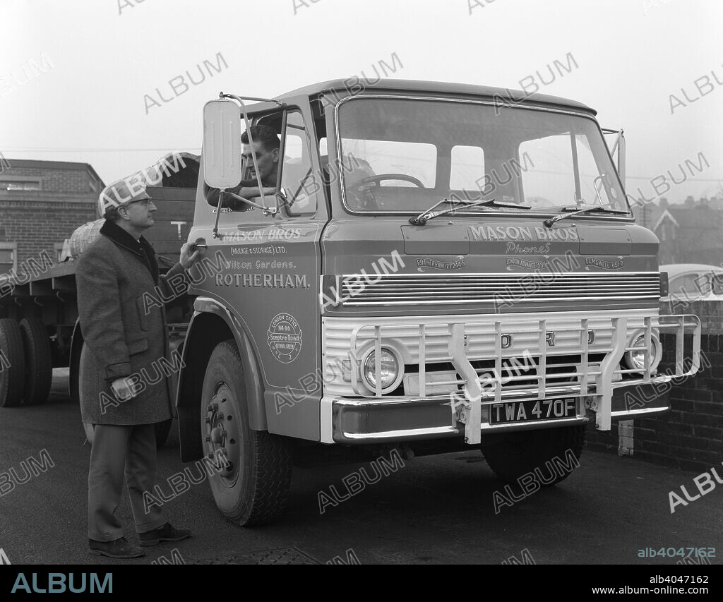 Ford D series lorry, Rotherham, South Yorksgire, 1967. Mason Bros Hauliers take delivery of a new Ford D series lorry from TC Harrison's in Rotherham. Harrison's were the main dealer for Ford in the town for many years.