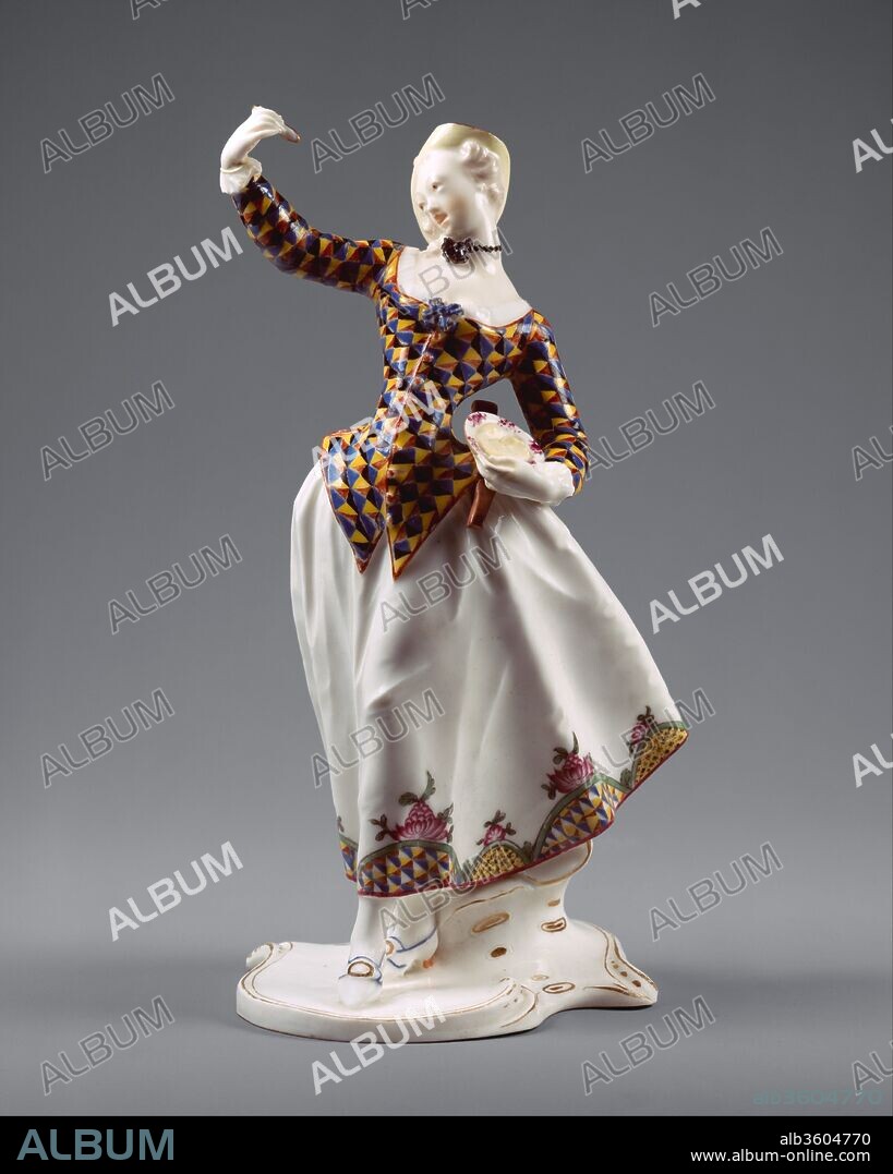 Harlequina. Culture: German, Nymphenburg. Dimensions: Height: 8 in. (20.3 cm). Manufactory: Nymphenburg Porcelain Manufactory (German, 1747-present). Modeler: Franz Anton Bustelli (Swiss, Locarno ca. 1720-1763 Munich). Date: ca. 1763.
In the eighteenth century, porcelain figures depicting characters from the Italian commedia dell'arte were extremely popular. The various characters that comprised a typical Italian comedy troupe were instantly recognizable to the audience because of their costumes, and the details of these costumes were faithfully copied in the porcelain figures. The male figure (see 1974.356.525) depicts Harlequin, the principal character of the commedia dell'arte, who always wears a suit composed of brightly colored patches. The female figure, Harlequina, is dressed in a complementary costume.
Italian commedia dell'arte figures were produced at all of the major German porcelain factories, but those made at Nymphenburg are among the most accomplished. Around 1760, Franz Anton Bustelli (ca. 1720-1763) modeled sixteen characters from the Italian commedia dell'arte, and these figures justify his reputation as one of the greatest of all eighteenth-century porcelain modelers. The characters are depicted in extremely elegant, slightly exaggerated poses that suggest movements in a dance and yet simultaneously convey some aspect of the character's personality.