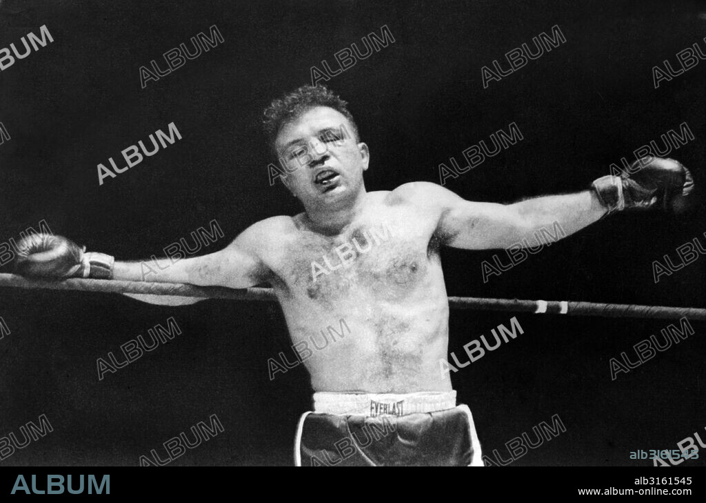 Chicago, Illinois: February 14, 1951 Boxer Jake 'Raging Bull' LaMotta in the thirteenth round of his final fight with Sugar Ray Robinson. LaMotta is nearly out on the ropes and the fight was stopped.