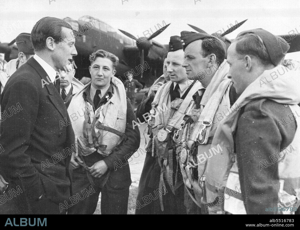 Operation Fido (Fog Investigation Dispersal Operations) First Pictures.Mr. Geoffrey Lloyd, Secretary of the Petroleum Warfare Department and the new Minister of Information, talking to R.A.F., fliers on one of the airfields where fog dispersal, apparatus in installed.These are the first official RAF photographs to be released of operation FIDO showing the way fog was dispersed by artificial means from RAF airfields FIDO provides the necessary heat on airfields to bring about fog dispersal by a continuous line of burners installed on each side of the main runway. October 29, 1945. (Photo by PNA).