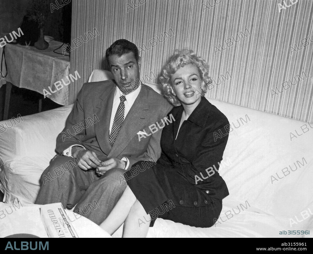 United States: c. 1954 Marilyn Monroe and Joe DiMaggio.