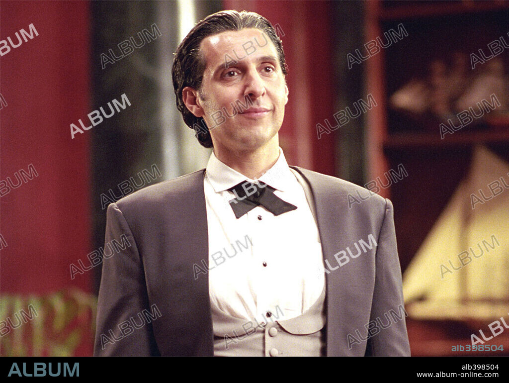 JOHN TURTURRO in MR. DEEDS, 2002, directed by STEVEN BRILL. Copyright COLUMBIA PICTURES.