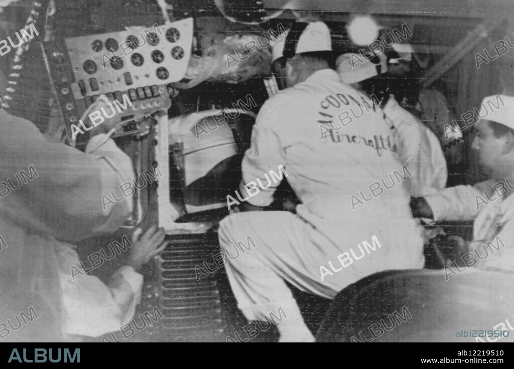 SPACE TRAVEL ENOS SPACE CHIMP SLID INTO MERCURY CAPSULE. 29 NOVEMBER 1961.