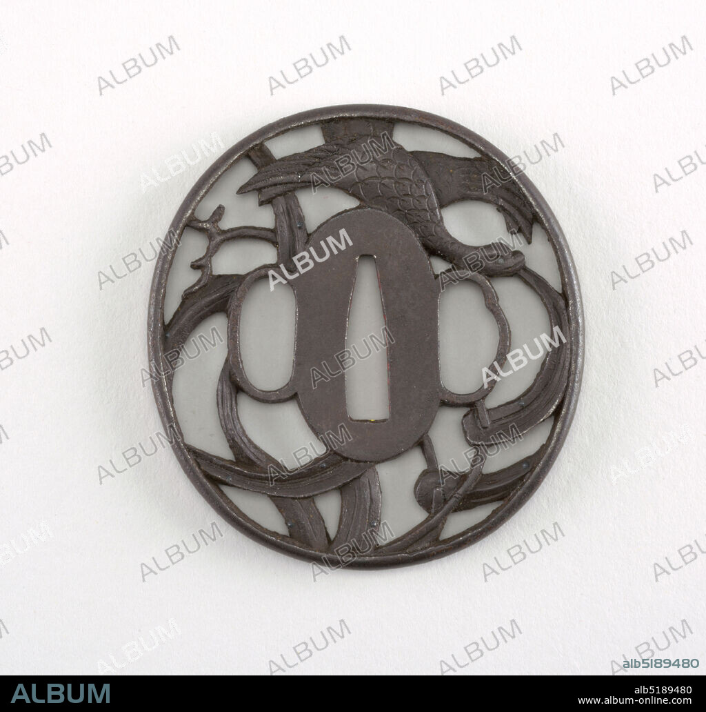 Tsuba, Iron, This iron tsuba is shinmaru gata (a true circle) in shape, and is crafted with sukashi (openwork) with a positive design showing Omodaka plants and a bird. At the center is a nakago-ana, an opening through which the sword passes. Surrounding this is the seppadai, a flat oval area that has a migaki ji (smooth) surface finish. On either side are ryo-hitsu, openings for the kozuka (utility knife) and the kogai (skewer tool). At right is sashi ura, the side which faces the blade, whose opening takes the negative form of a moon. Opposite is the sashi omote side, which faces the sword hilt. Its tri-lobed opening is of the suhama type, and symbolically represents the coastline of Horai, the holy island of the Immortals. The rim of the tsuba is round, or maru-mimi., Japan, 17th century, metalwork, Decorative Arts, Tsuba.