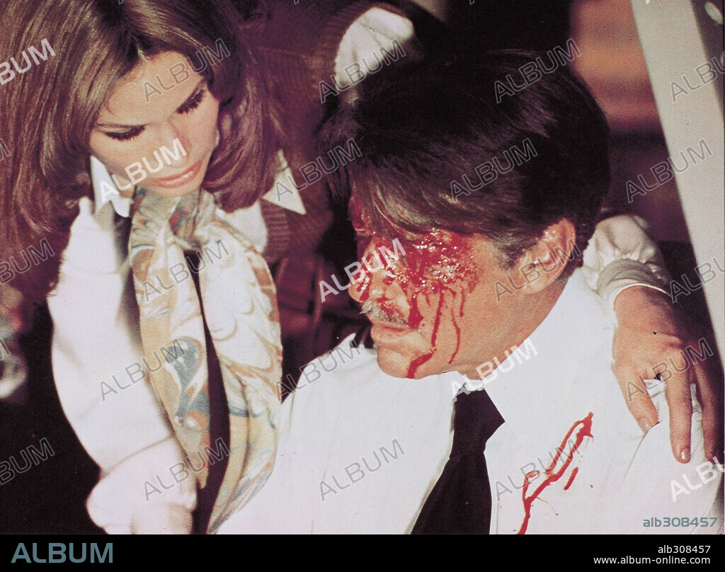 EFREM ZIMBALIST JR. and KAREN BLACK in AIRPORT 1975, 1974, directed by JACK SMIGHT. Copyright UNIVERSAL PICTURES.